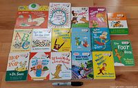 Overview of all books laid out on floor