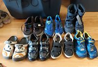 All six pairs of shoes laid out showing styles and colours