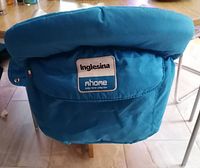 Rear view showing Inglesina logo patch and fabric condition