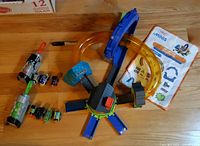 Overall lot with stunt set, launcher, six MINIS engines