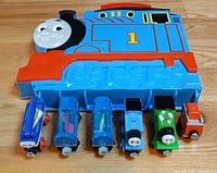 Front view of case with six trains aligned