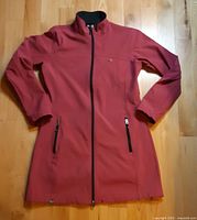 Front view of pink Vuarnet long jacket showing full zipper and pockets