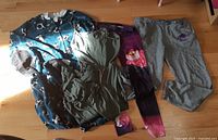 Group shot of all four lounge wear pieces laid out