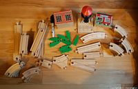 Full lot showing track pieces, buildings, trees and accessories