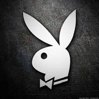 Black and white image of the Playboy bunny logo on a textured dark background.