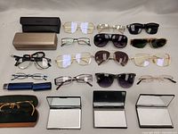 Full view of all frames and cases arranged on a surface, showing variety and quantity