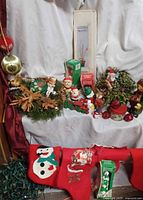 Group shot of all Christmas décor items including lights, figurines, wreaths, ornaments and stockings
