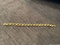 Full length of bracelet laid flat showing link pattern