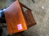 Top view of the wooden end table showing smooth polished rectangular table surface with visible wood grain.