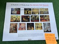 Photo of the portfolio cover showing the title 'A Portfolio of Works from The Salvador Dali Museum' with thumbnails of 12 different Salvador Dali artworks.