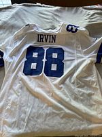 Back of the white Nike NFL Dallas Cowboys jersey with Michael Irvin name and number 88 in blue