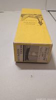 Yellow rectangular Model Shipways box for the Phantom model ship kit, closed view showing branding and artwork.