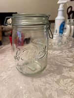 Front view showing Le Parfait embossing and overall jar