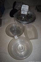 Brita dispenser top, three round platters, nested bowls and additional serving pieces