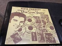 Front cover of the vinyl record showing Elvis Presley and Sun Records logos.