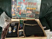Overview of the complete vintage Sears Auto Road Racer slot car set.