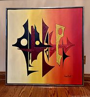 Full view of abstract acrylic painting on canvas with a square metal frame, showing the artwork details and colors.