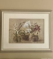 Framed painting displaying three different flower arrangements in pots with neutral color tones, placed against a neutral background.