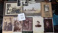 Assorted mounted photographs, group and individual portraits, building scene