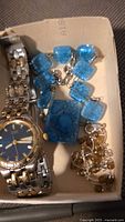 Citizen watch with blue glass bracelet and brown bead anklet in box