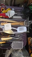 Overall assortment of utensils on tray