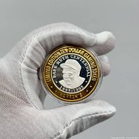 Front side of the coin showing the Babe Ruth portrait with inscriptions for the Centennial year and denomination details.