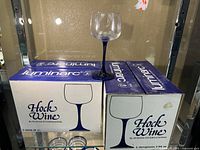 12 Hock Wine blue stemmed glasses in original Luminarc boxes with one glass displayed