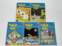 Five Krazy Kat Komix comic books laid flat showing all front covers