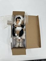 Full view of Heritage Collection doll in box with bubble wrap
