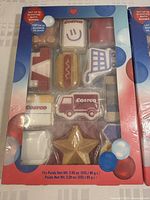 Single unopened pack of Revolution Costco themed bath bombs with 12 uniquely shaped bath bombs in the box.