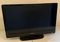Front view of the 32-inch Philips TV showing the screen and the Philips logo on the bezel below the screen.