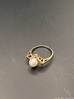 Ring at three-quarter angle showing overall design and profile.