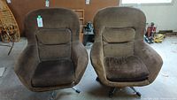 Both chairs side by side front view in workshop setting