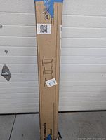 Box of FLEXIMOUNTS 4x8 overhead storage rack, showing product image and brand.