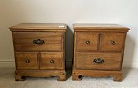 Front view of both nightstands showing their drawer arrangements and finishes.