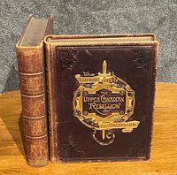Two volumes upright showing spines and front cover of Volume I
