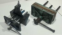 Both woodworking vises placed side by side showing overall construction and size difference.