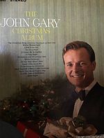 Front cover of The John Gary Christmas Album showing title, artist, song list and photo of John Gary wearing tuxedo.