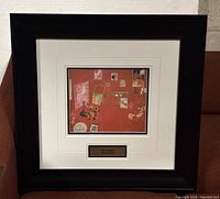 Framed lithograph print viewed head-on, showing the full artwork and frame.