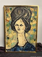 Full view of the framed painting by Martin Hirschberg showing the portrait of a woman with large dark hair and an elongated neck, set on a multicolored abstract background.