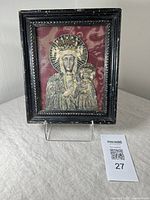 Full view of the framed artwork showing Mary and Jesus on a stand, with QR code visible.