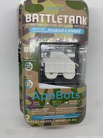 Front of sealed package showing Desk Pets AppBots Battletank white tank inside blister
