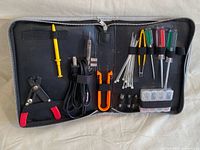 Open kit showing all tools secured in case