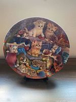 Front view of the Bradford Exchange "Frisky Business" plate on stand