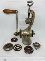 Full view of grinder assembled with loose attachments laid out