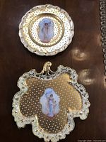 Photo of both antique porcelain tray and matching plate on wooden surface, showing overall design and condition.