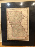 Framed full view of the antique county and township map showing Iowa and Missouri with colored counties.