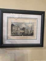 Framed antique hand colored engraving titled 'West Side of Langham Place' showing a street scene with buildings, pedestrians, and horse carriage.