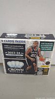 Opened unopened retail box of 2023-24 Crown Royale basketball cards featuring Tim Duncan on the box front