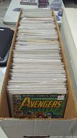 Photo of comics in a long box showing Avengers issue #218 on top